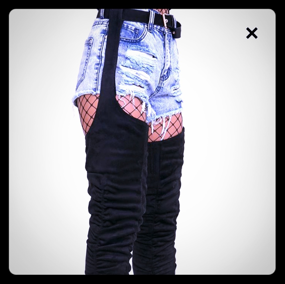 Thigh high belted boots